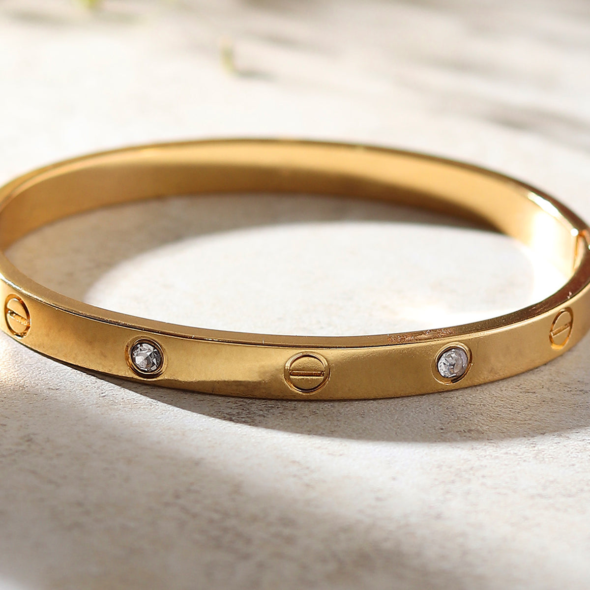 NUSH Jewel Gold-Tone Screw Motif Crystal Bracelet for Women